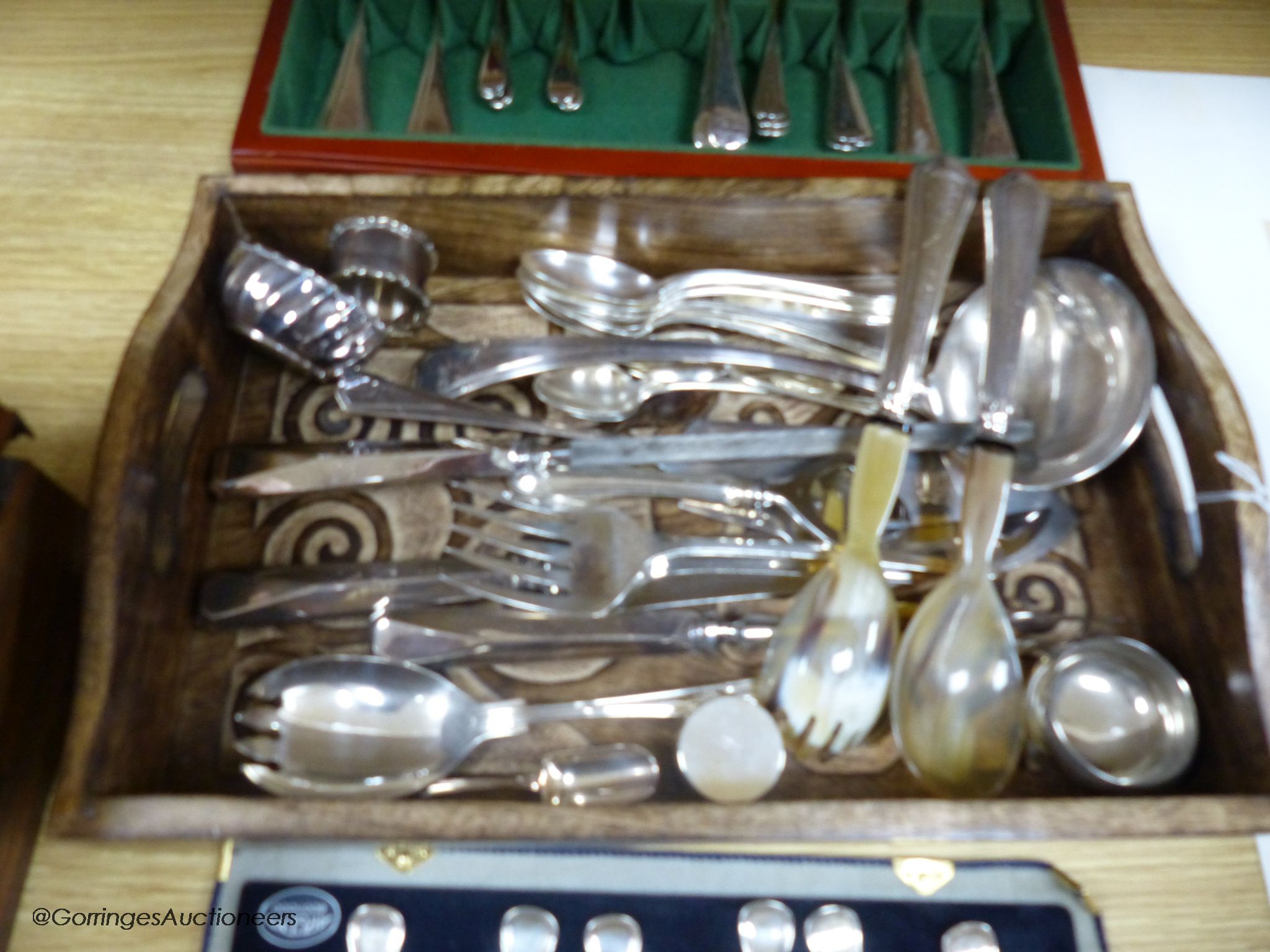 Five Italian 800 standard tea spoons, and six dessert spoons, a silver napkin ring, an 800 standard pill box and a quantity of plated cutlery.